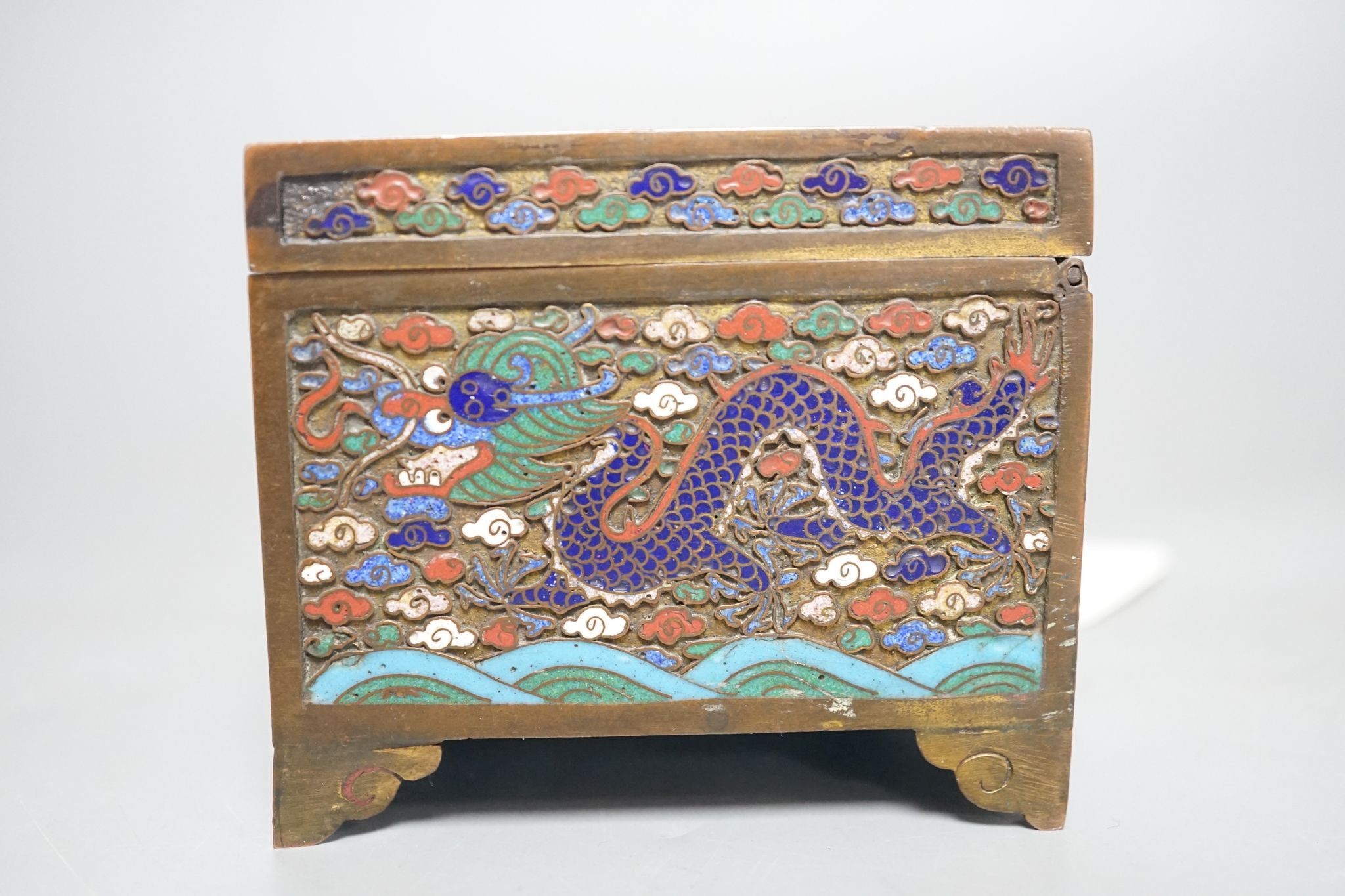 A Chinese bronze and cloisonné enamel ‘dragon’ box and cover, early 20th century, 6 cms high x 11.5 cms wide.